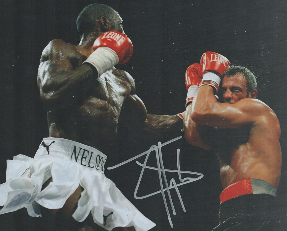 Lot 189: Johnny Nelson, MBE signed colour photo 10x8 Inch...