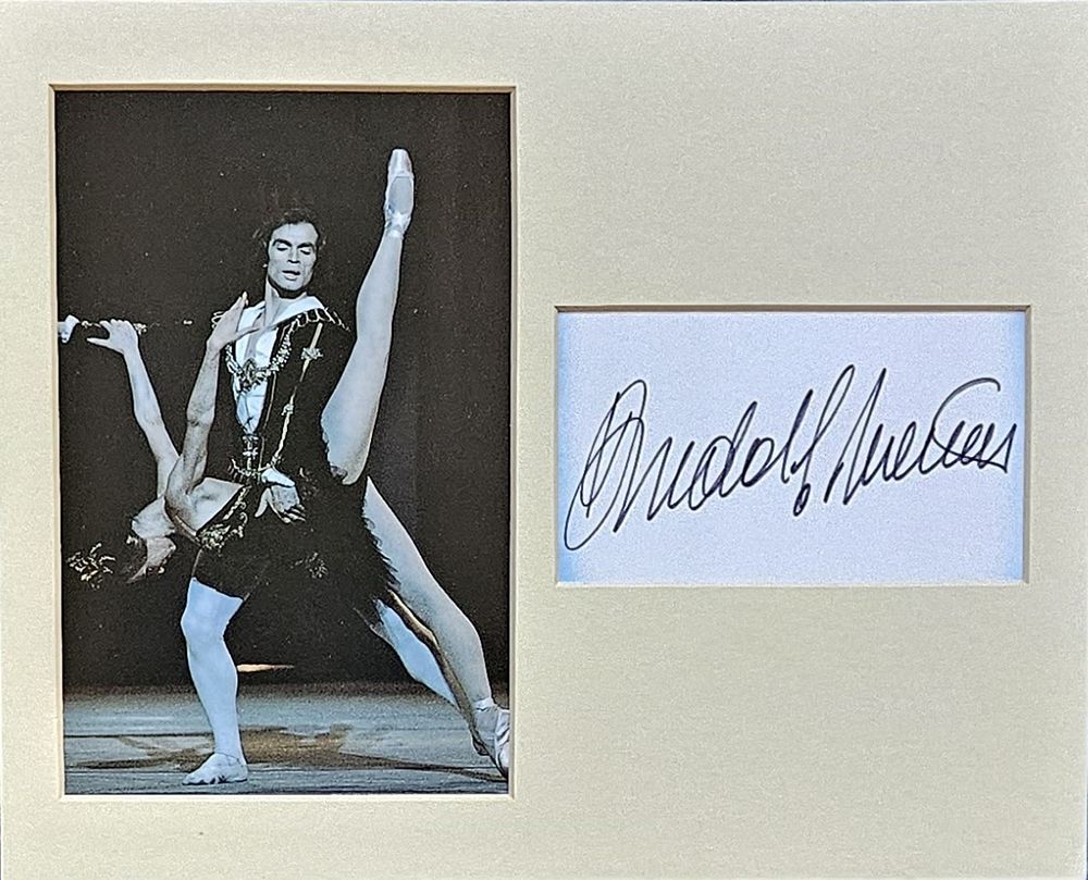 Lot 261: Rudolf Nureyev 12x10 inch overall mounted signature piece...