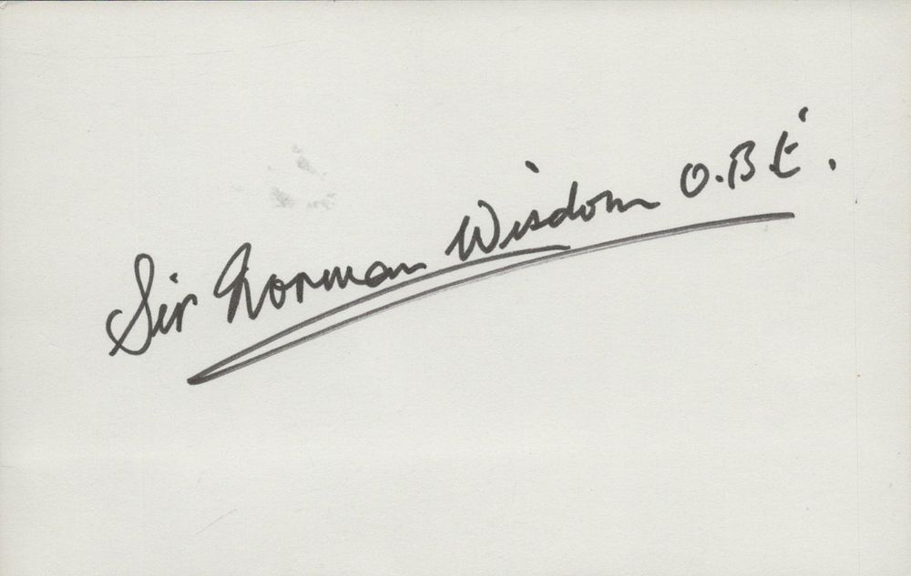 Lot 279: Sir Norman Wisdom signed 6x4inch white card. Good...