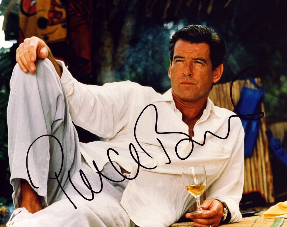 Lot 282: Pierce Brosnan signed 10x8inch colour photo. Good condition....
