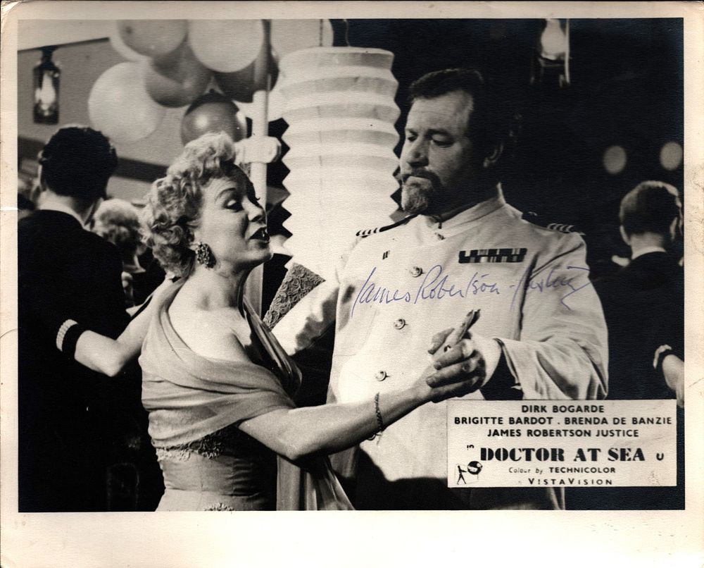Lot 573: James Robertson Justice signed 10x8inch black and white...