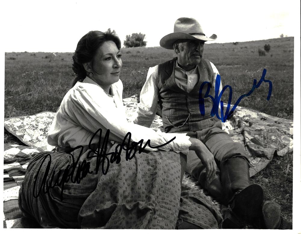 Lot 589: Robert Duvall and Angelica Huston signed 10x7inch black...