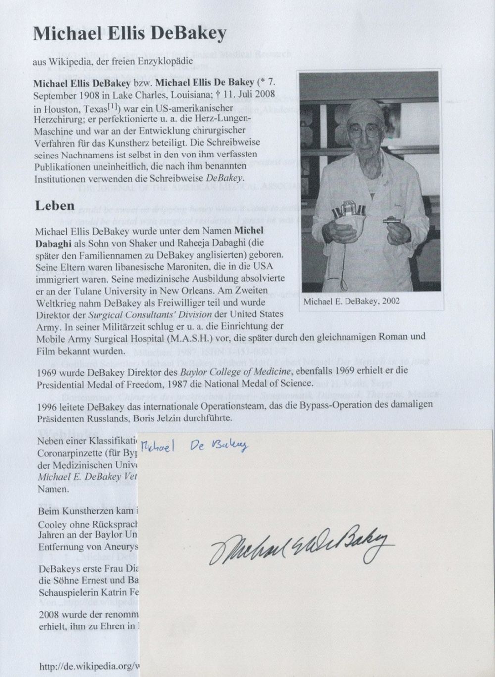 Lot 201: Michael Ellis DeBakey signed album page, Comes with...