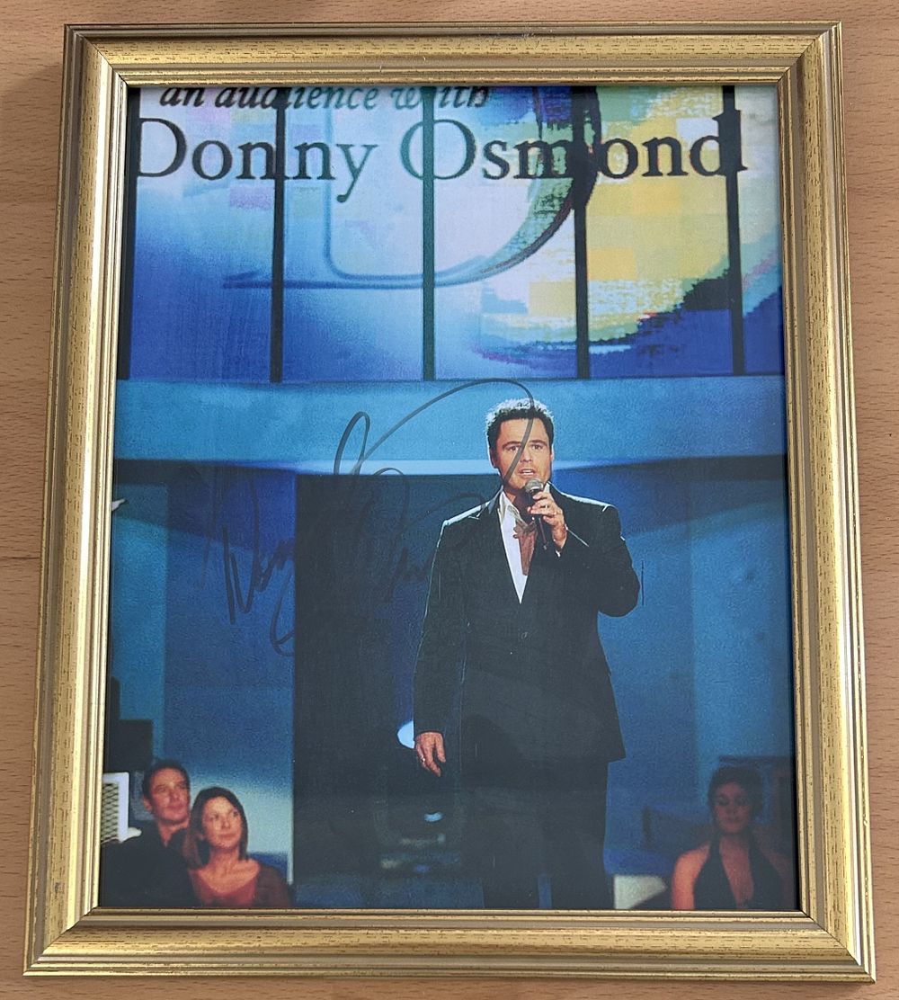 Lot 181: Donny Osmond signed 11x9 inch overall framed colour...