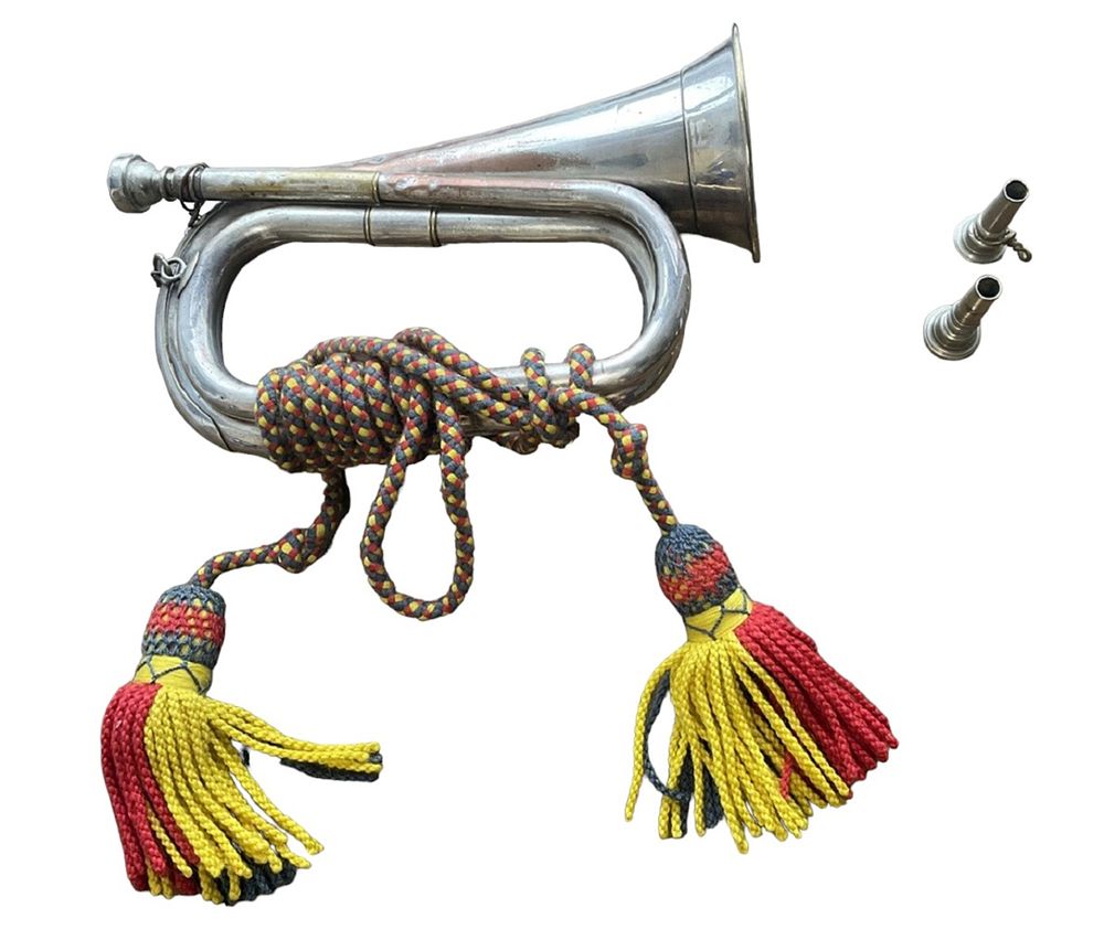 Lot 185: Royal Marines Bugle made by Boosey and Hawkes...