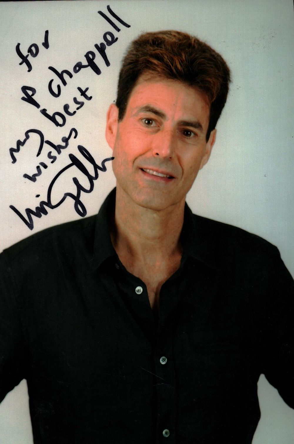 Lot 235: Uri Geller signed 6x4inch colour photo. Dedicated. Good...