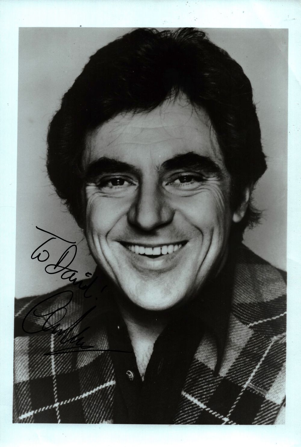 Lot 236: Anthony Newley signed 7x5inch black and white photo....