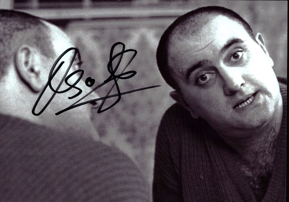 Lot 249: Alexis Sayle signed 7x5inch black and white photo....