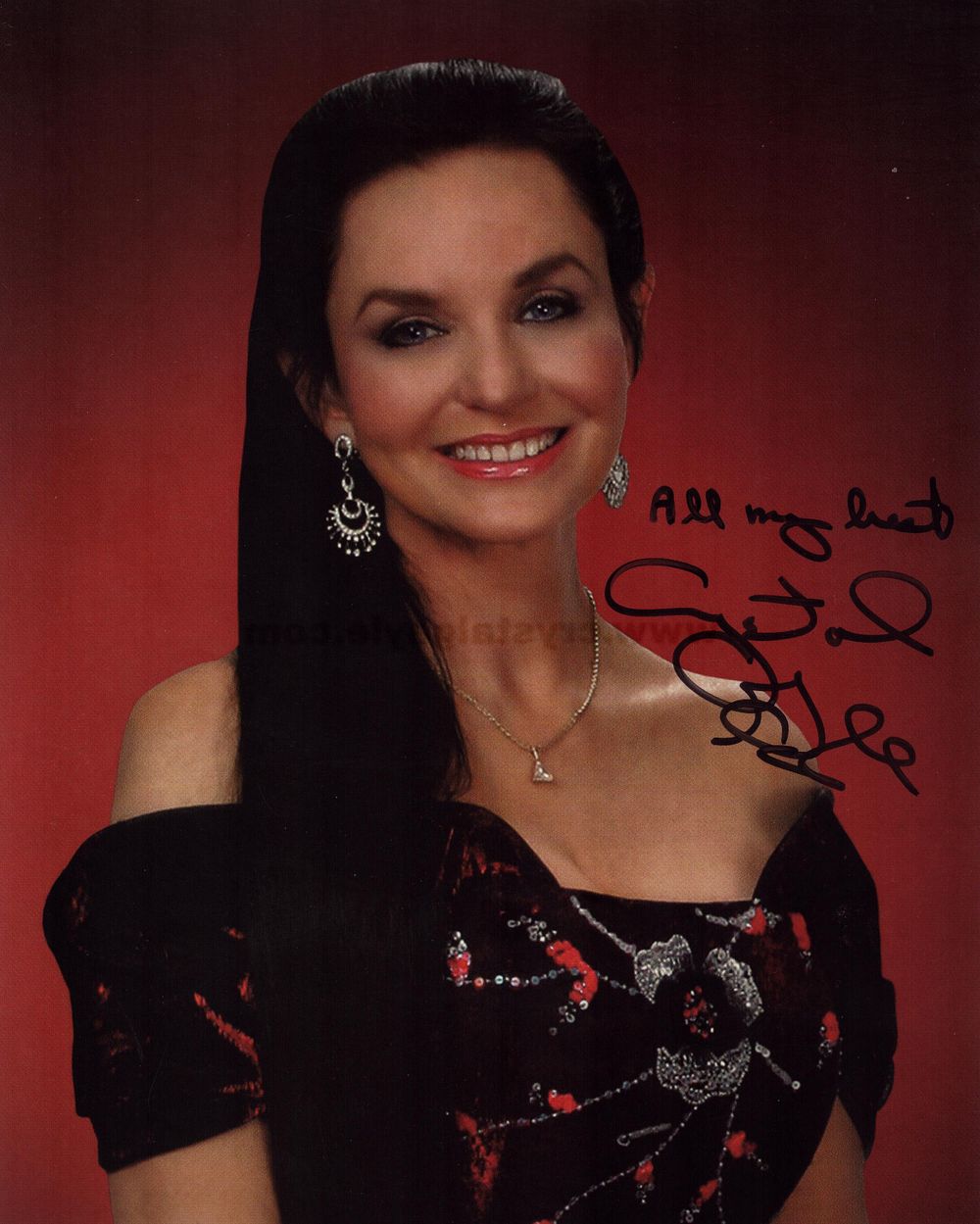 Lot 356: Crystal Gayle signed 10x8inch colour photo. Good condition....