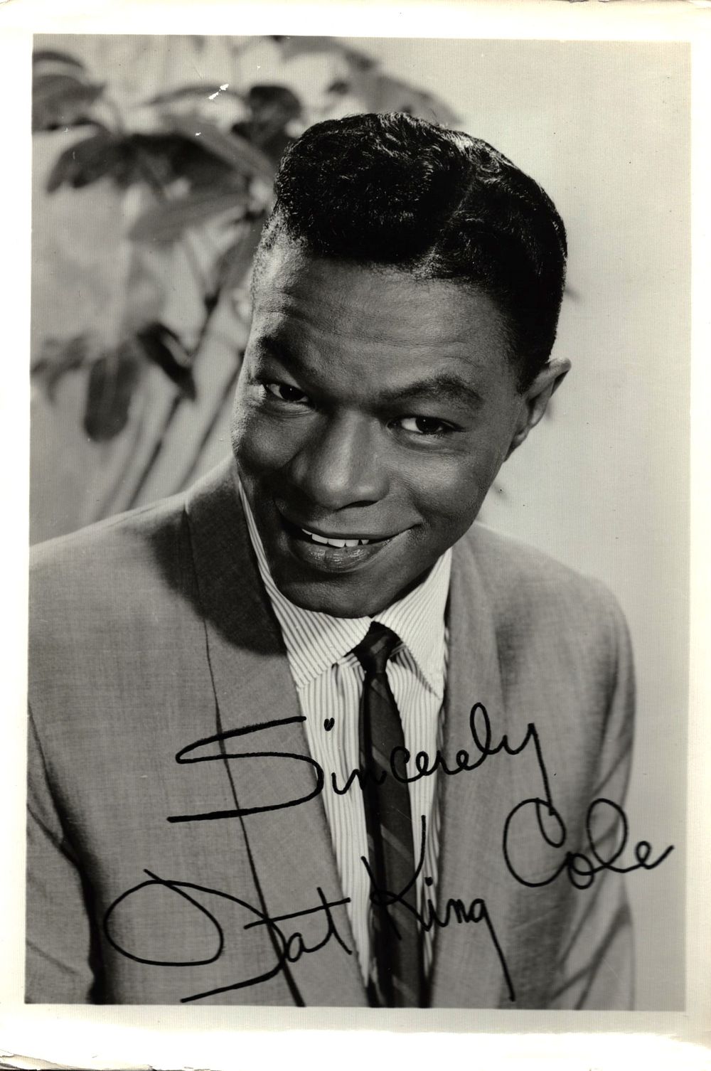 Lot 384: Nat King Cole signed 7x5inch black and white...