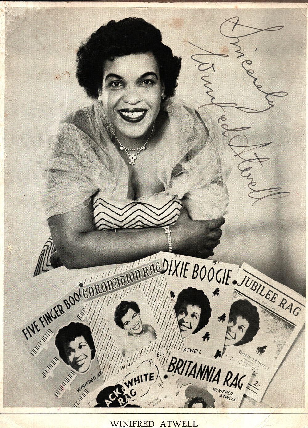 Lot 398: Winifred Atwell signed 10x8inch black and white photo....