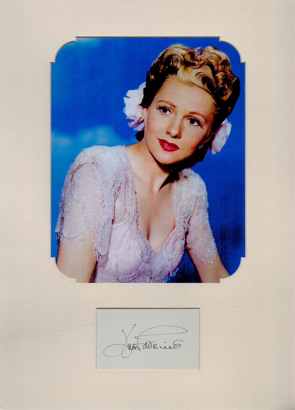 Lot 499: Joan Fontaine signed 4x2.5 inch signature piece mounted...