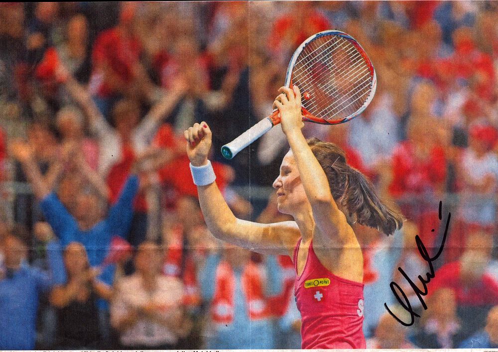 Lot 650: Viktorija Golubic signed 11x8 inch newspaper colour photo....