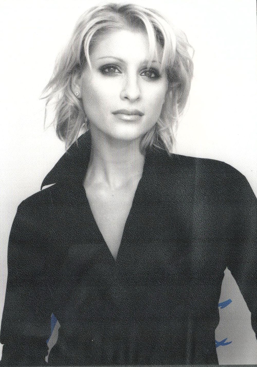 Lot 693: Dani Behr signed 7x5 inch black and white...