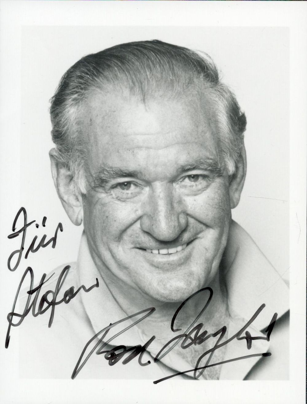 Lot 697: Rod Taylor signed 5x3inch black and white photo....