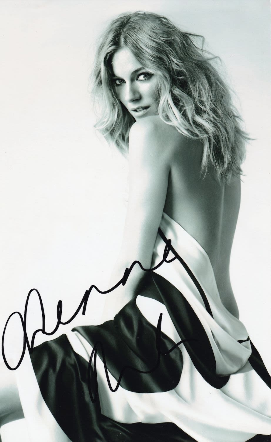 Lot 254: Sienna Miller, Popular American Actress, 10x8 inch Signed...