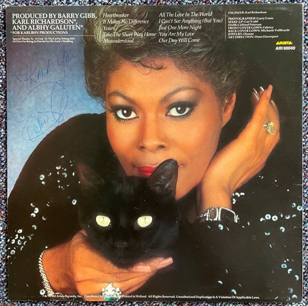 Lot 133: DIONNE WARWICK Singer signed to the back cover...