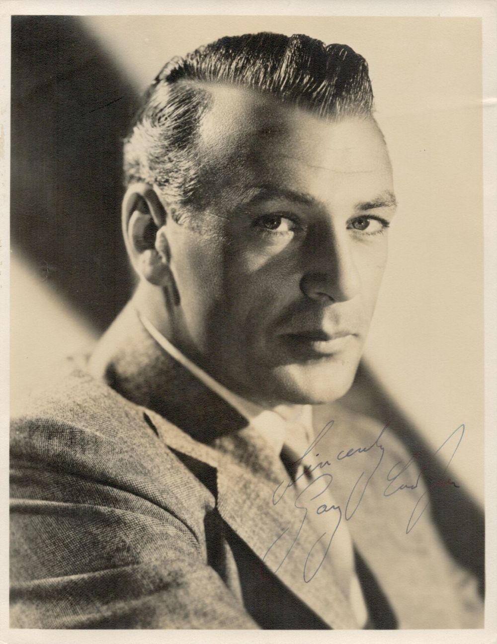 Lot 252: Gary Cooper signed 9x7 vintage sepia photo with...