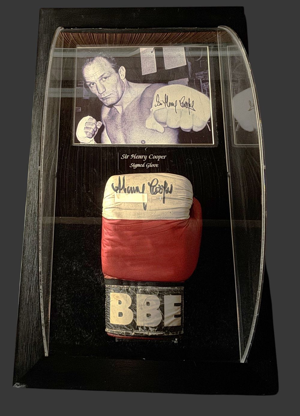 Lot 161: Sir Henry Cooper signed Boxing glove, mounted and...
