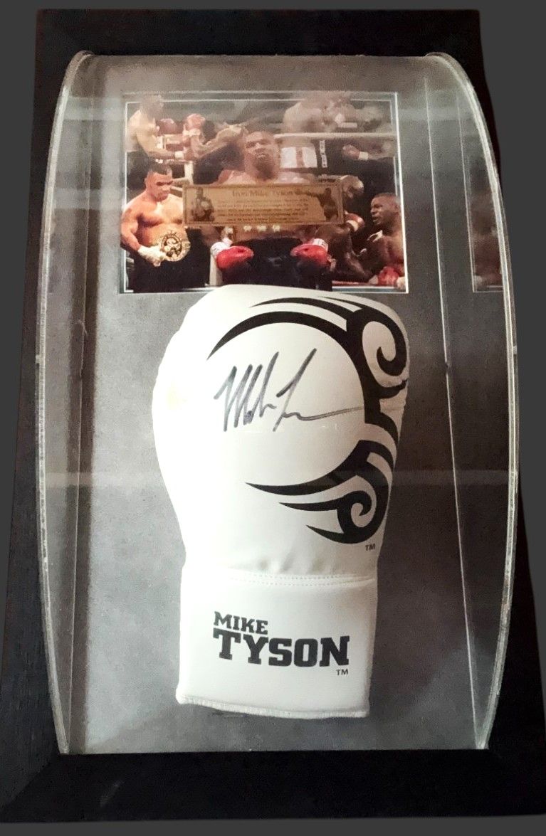 Lot 162: Mike Tyson signed Boxing glove, mounted and framed...