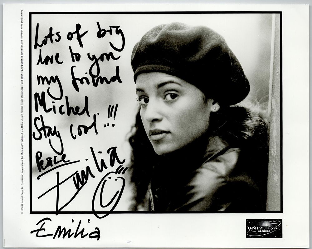 Lot 155: Emilia signed 10x8inch black and white photo. Dedicated....