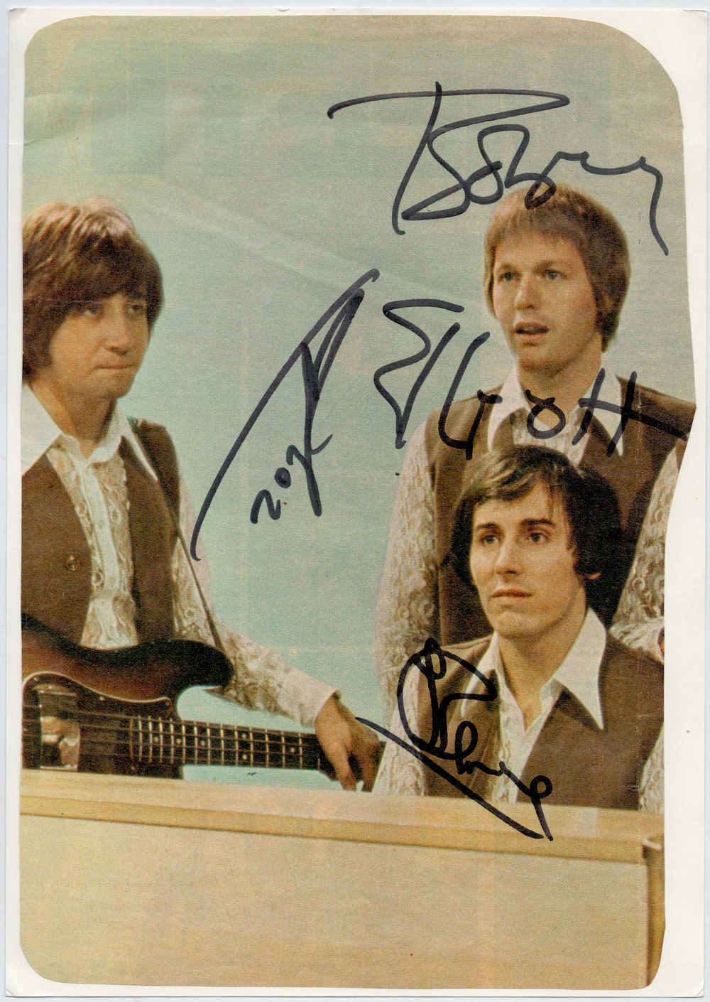 Lot 192: The Hollies magazine signed magazine photo. Good condition....