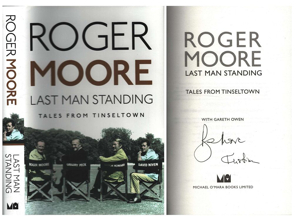 Lot 157: Roger Moore signed hardback book titled Last Man...