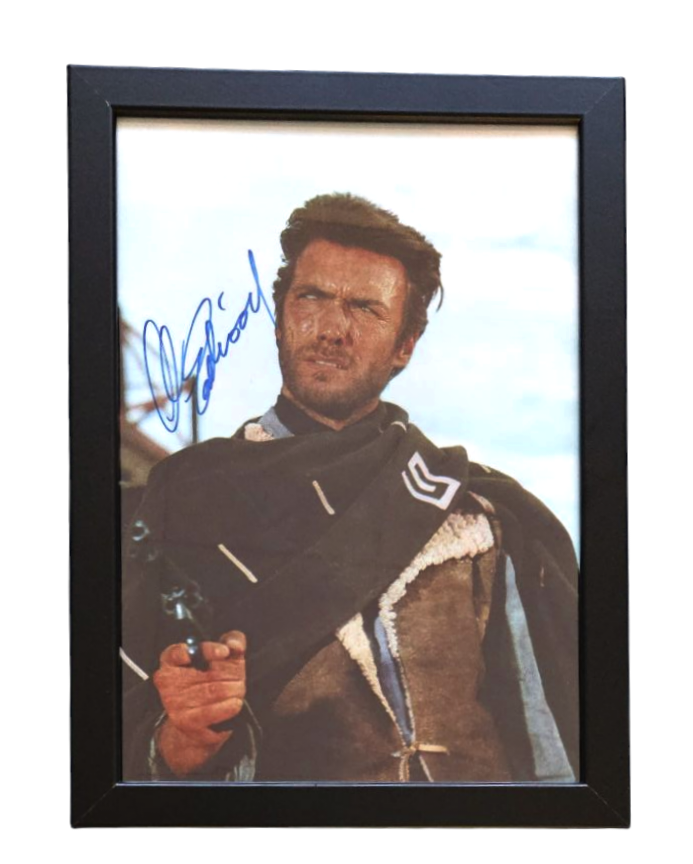 Lot 206: Clint Eastwood signed 13x10inch overall framed and mounted...
