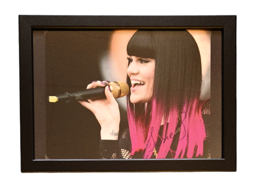 Lot 208: Jessie J signed 13x10inch overall framed colour photo....