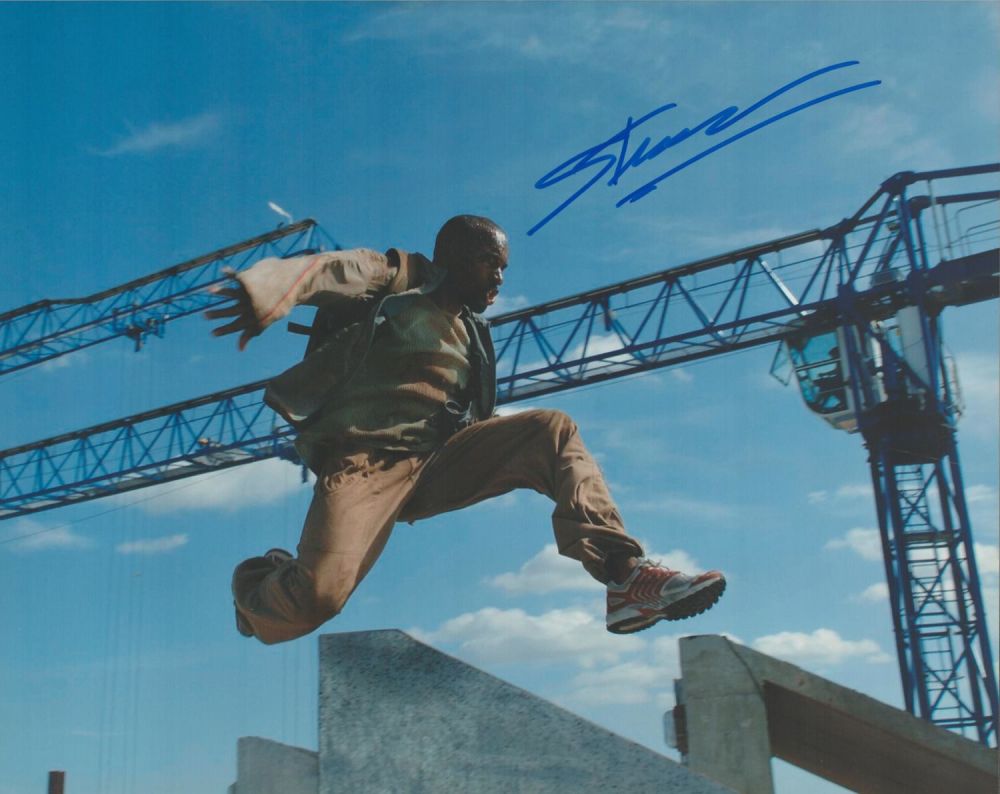 Lot 157: Freerunner, Sébastien Foucan signed 10x8 colour photograph pictured...