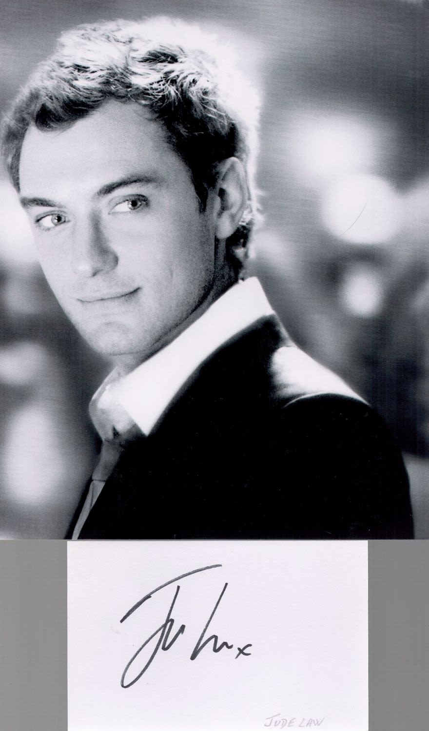 Lot 498: Jude Law signed 6x4 album page and unsigned...