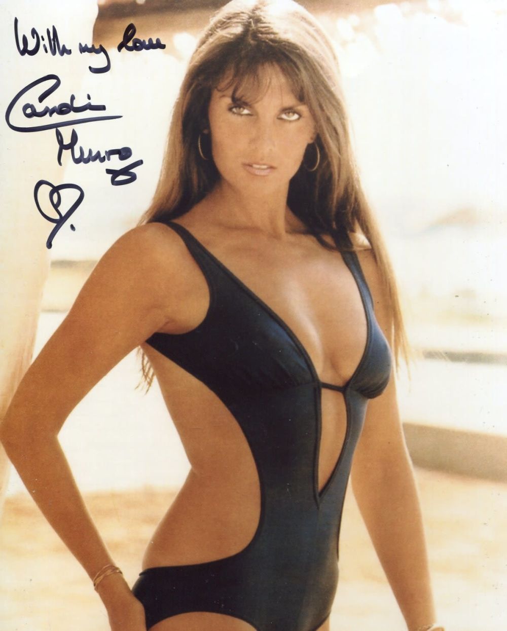 Lot 669: 007 Bond girl Caroline Munro signed sexy swimsuit...