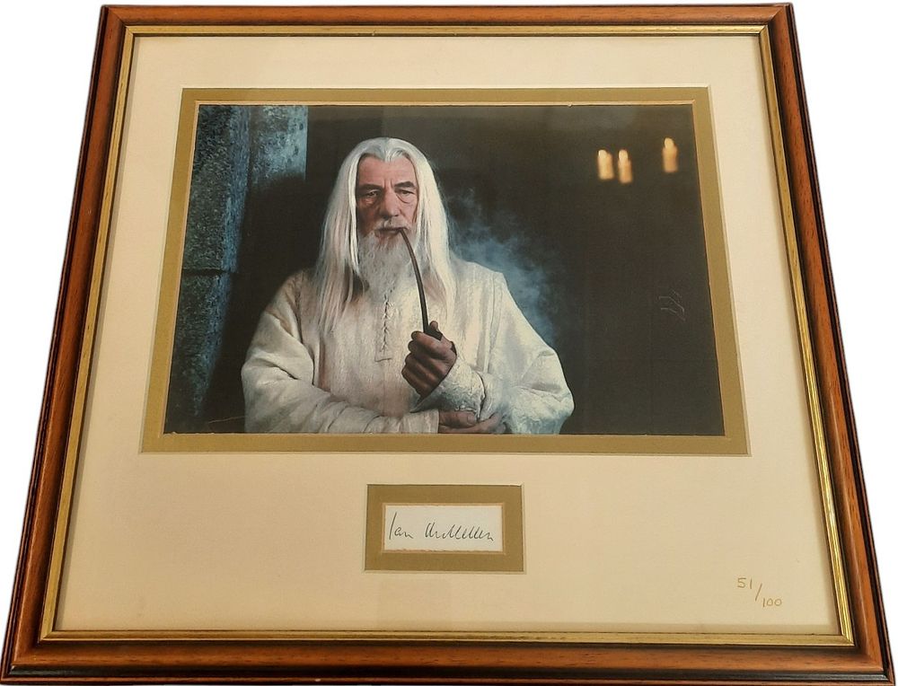 Lot 545: Sir Ian McKellen signature piece with colour photo...