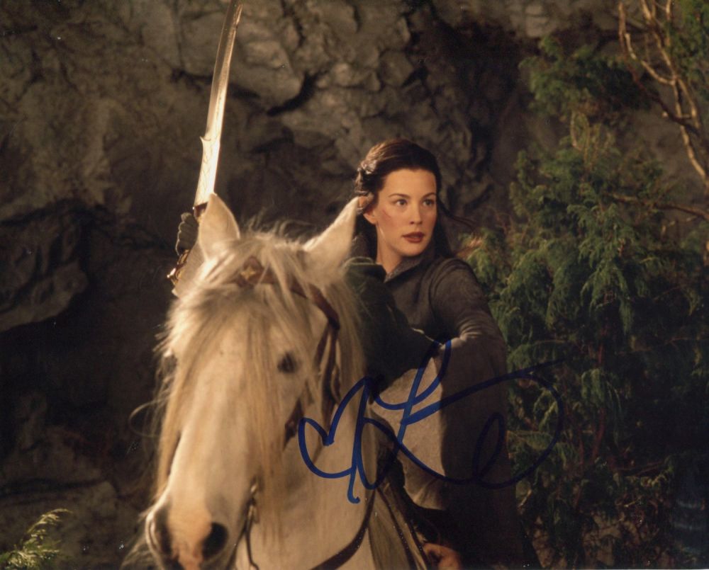 Lot 111: Liv Tyler signed 8x10 photo as Arwen in...