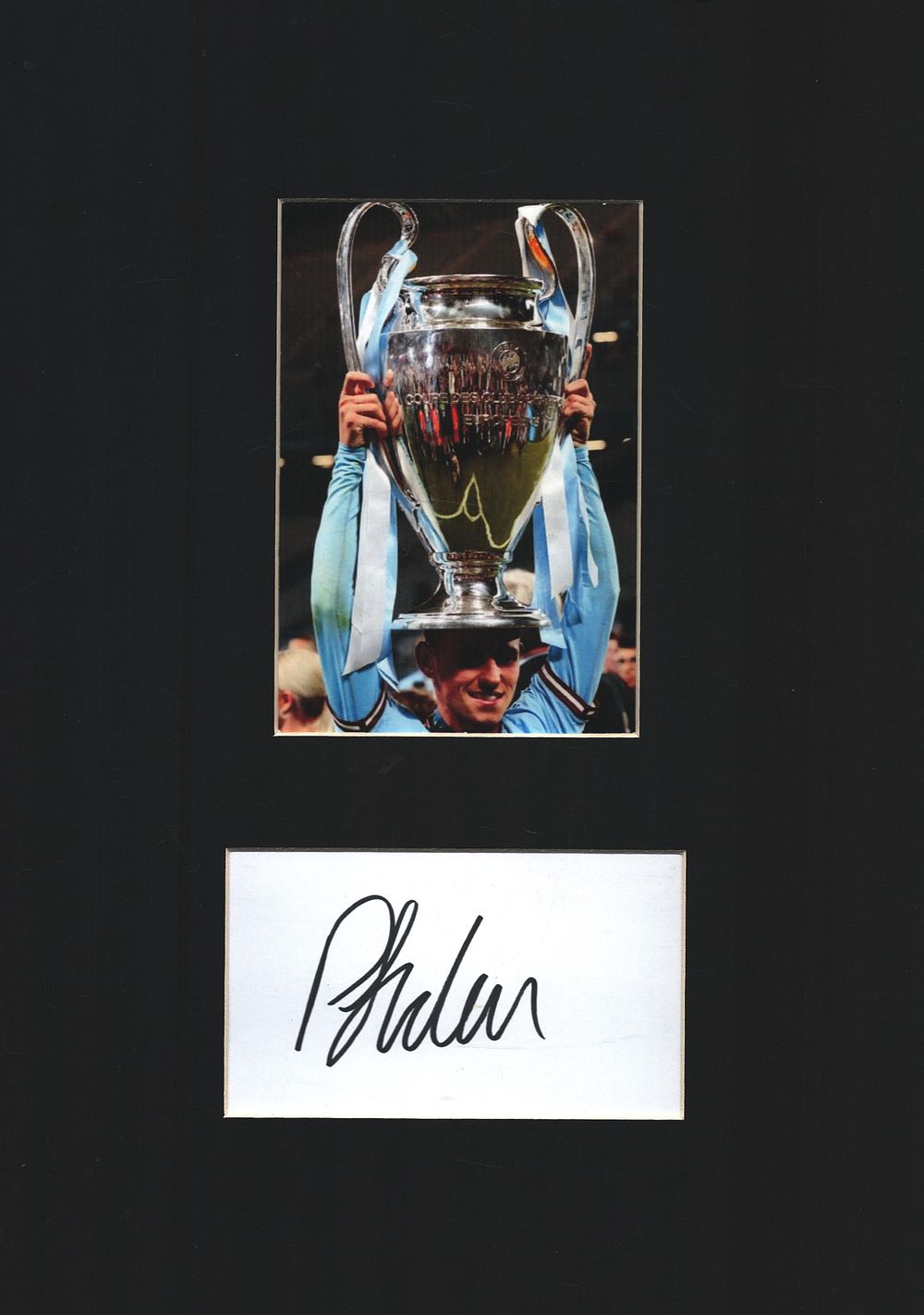Lot 496: Phil Foden signed white card mounted below colour...