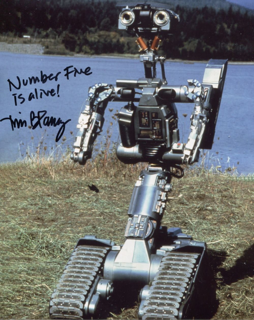 Lot 139: Short Circuit movie photo signed by Tim Blaney,...