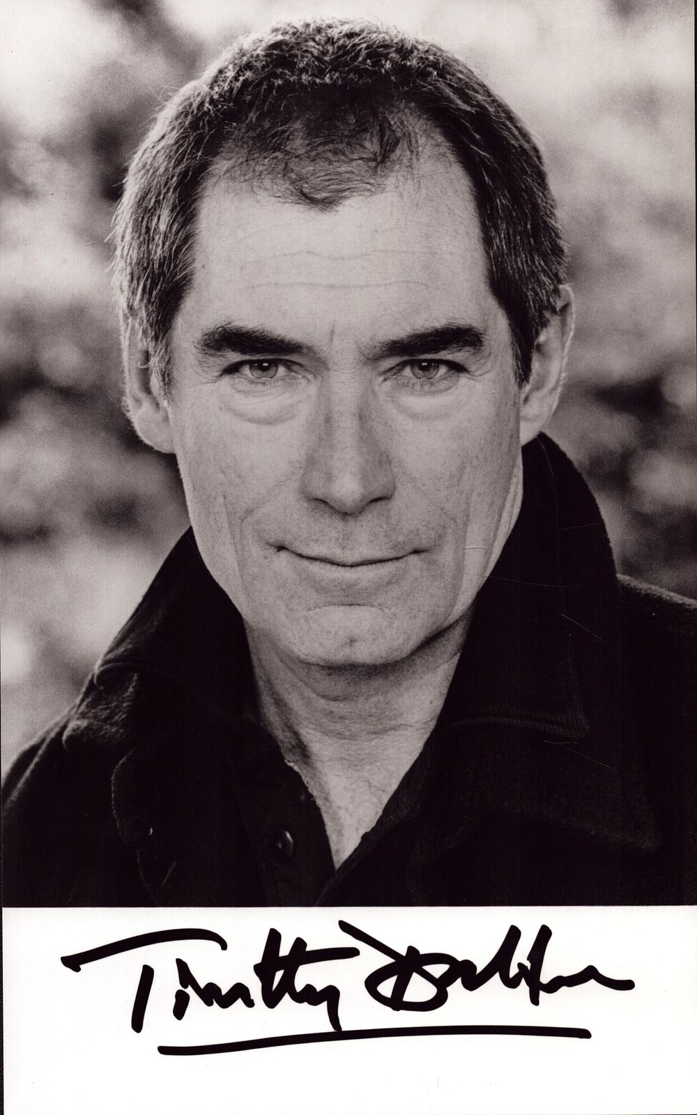 Lot 167: TIMOTHY DALTON James Bond Actor signed Photo. Good...
