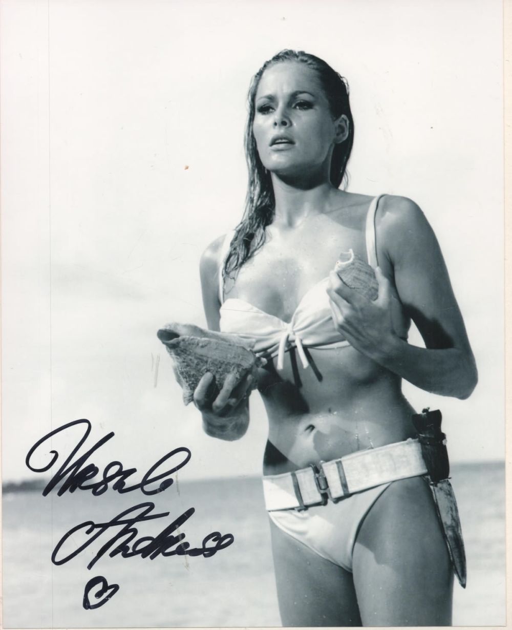 Lot 213: Ursula Andress signed James Bond 10x8 black and...