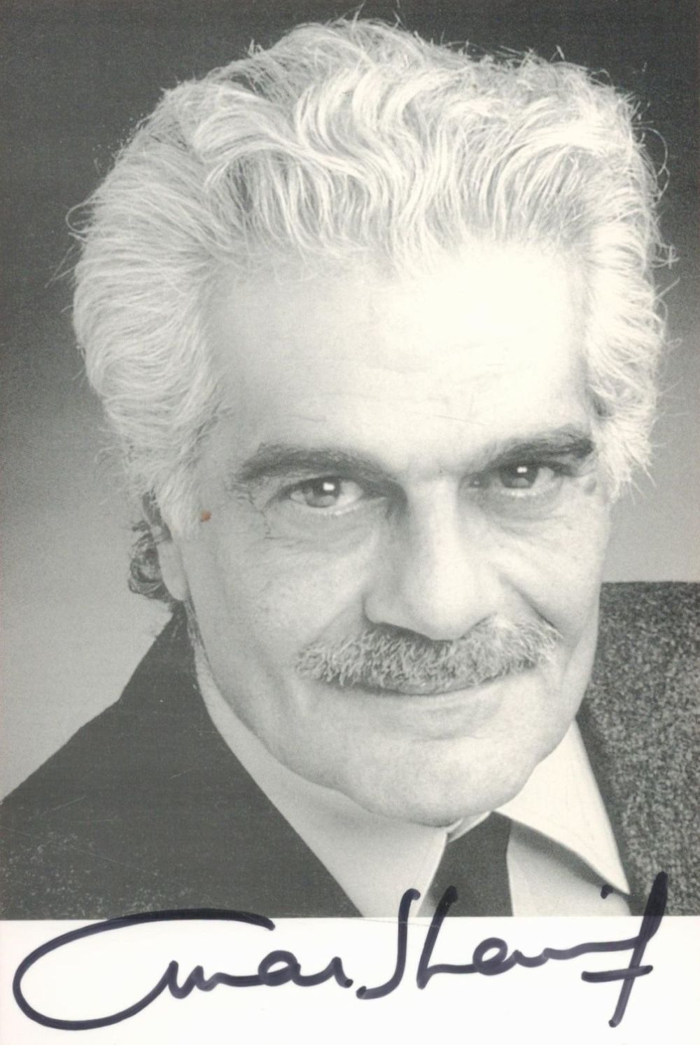 Lot 236: Omar Sharif signed 6x4 black and white photo....