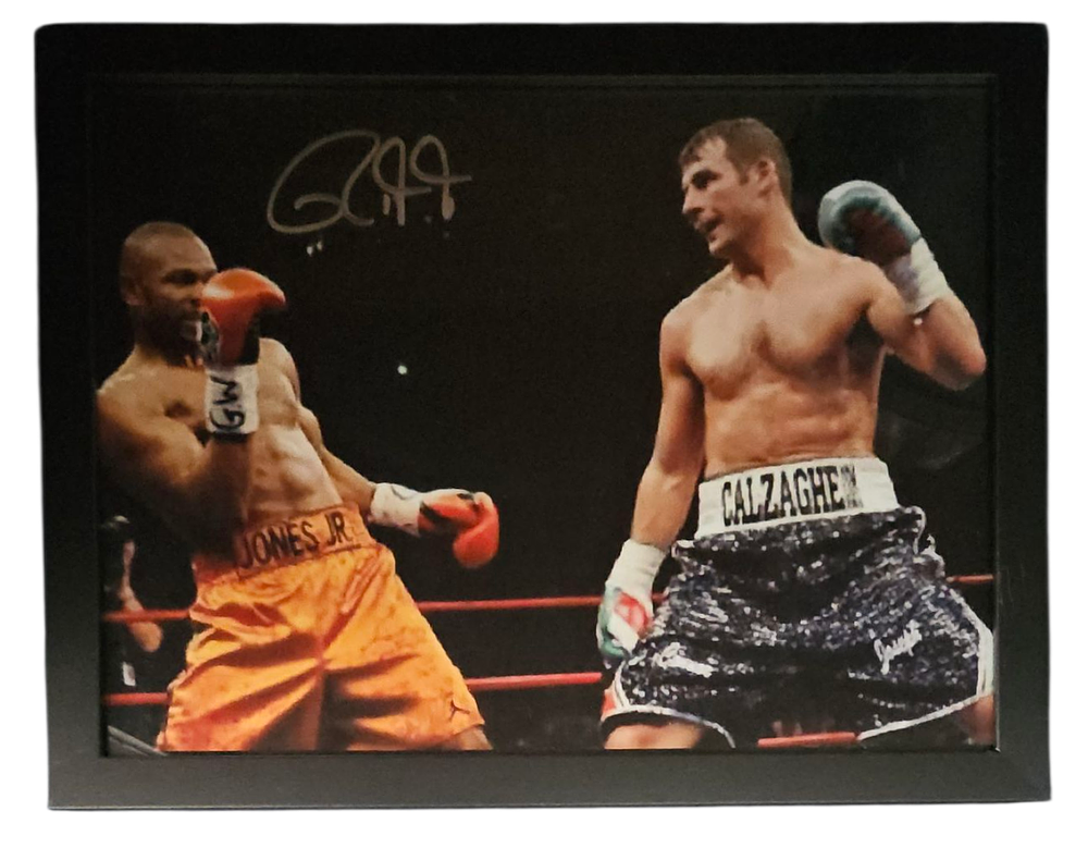Lot 371: Roy Jones Jnr signed colour photo. Framed to...