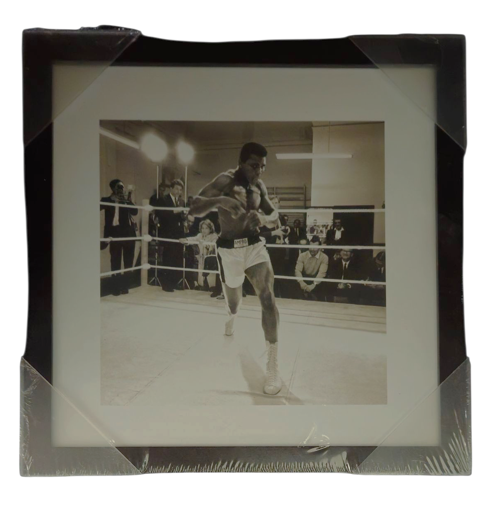 Lot 375: Muhammad Ali unsigned black and white photo. Framed...