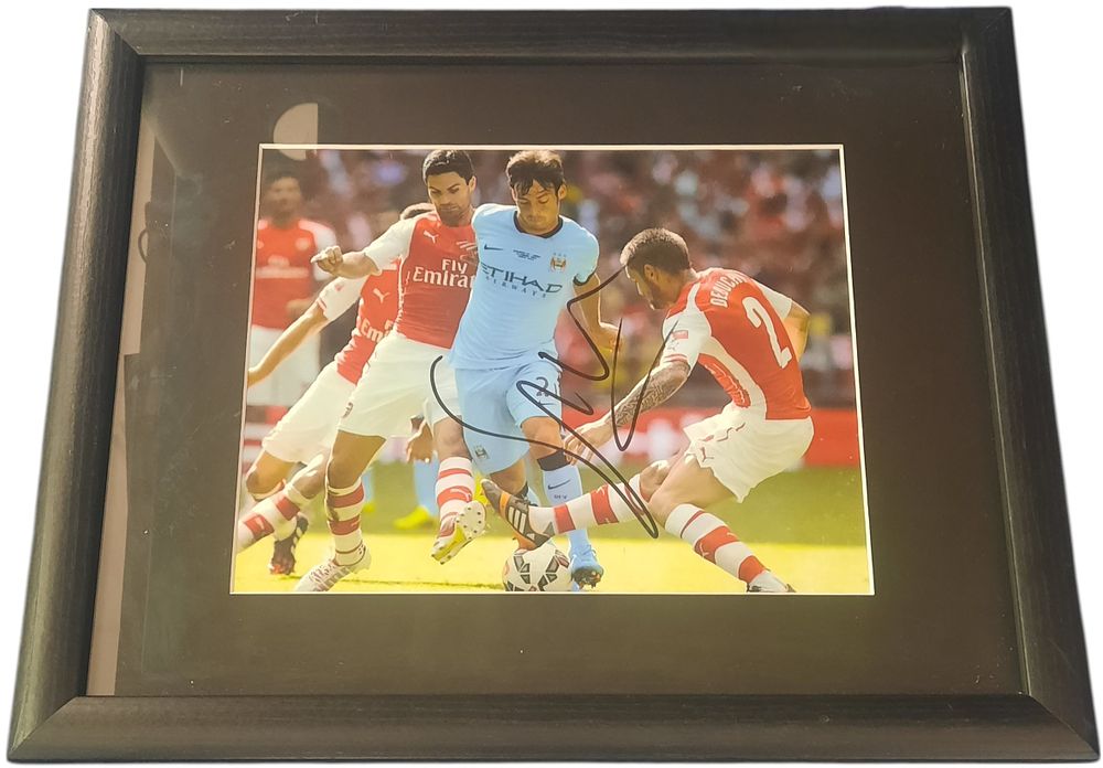 Lot 378: David Silva signed colour photo. Mounted and framed...