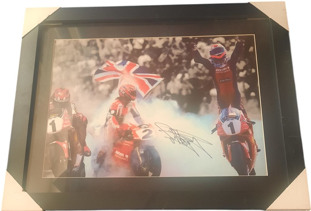 Lot 379: Carl Fogarty signed colour montage photo. Mounted and...