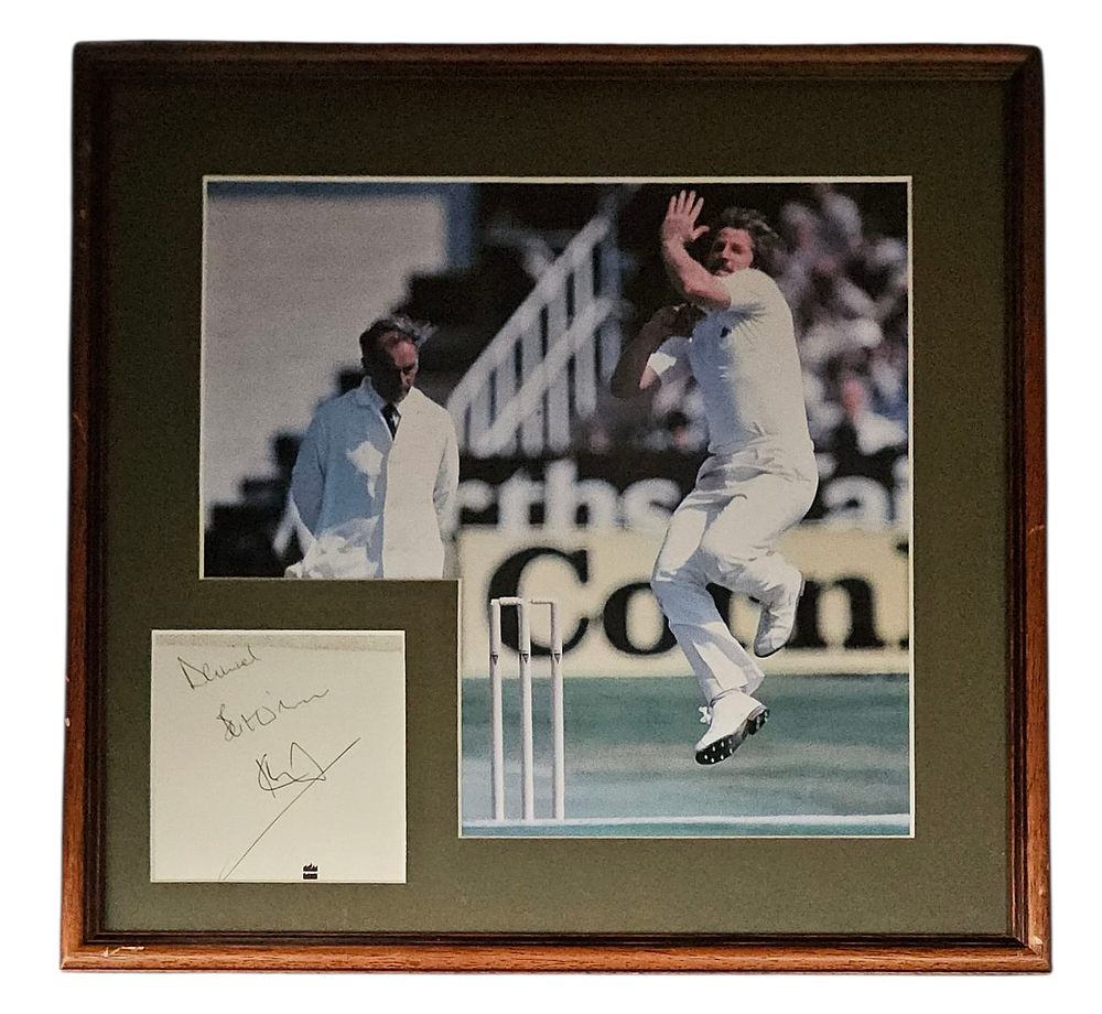 Lot 426: Ian Botham signed white card. Mounted and framed...