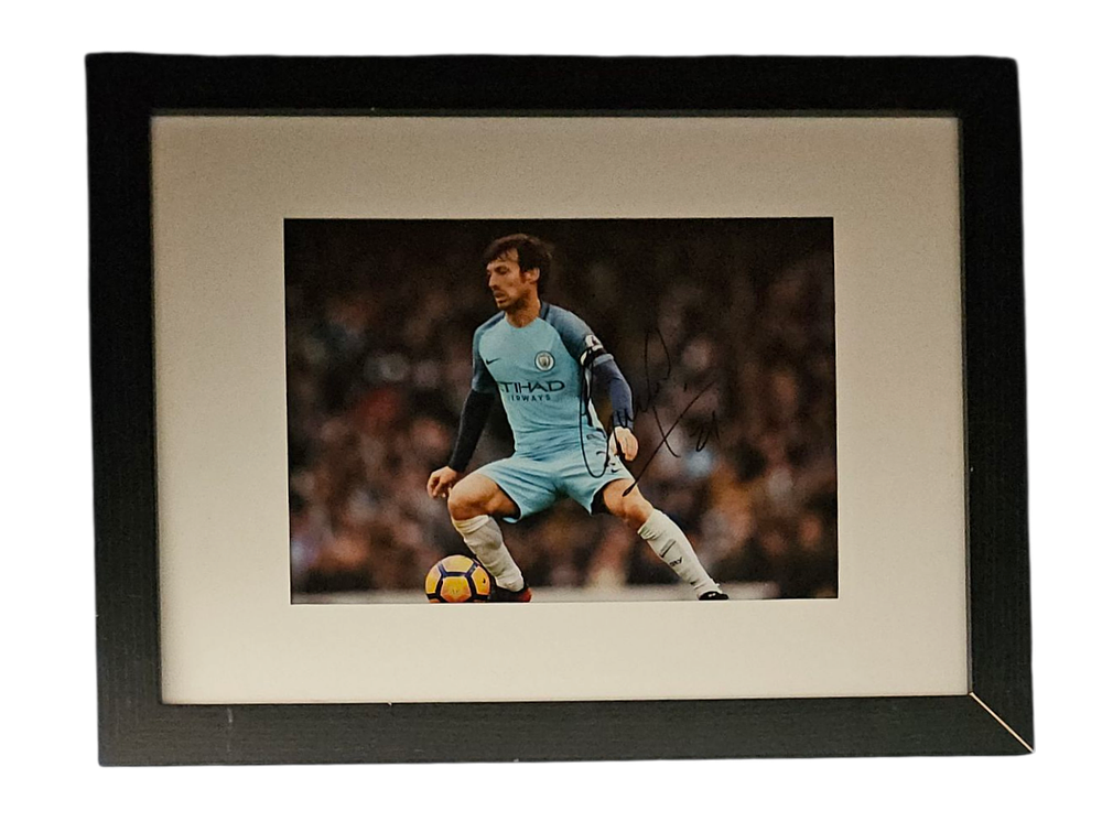 Lot 427: David Silva signed colour photo. Mounted and framed...
