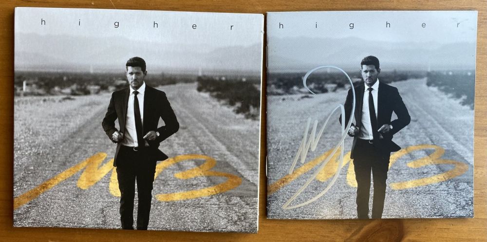 Lot 341: Michael Buble signed album sleeve titled Higher signature...