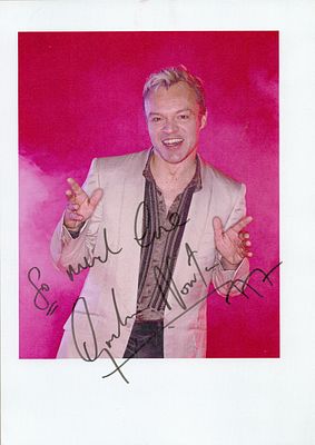 Graham Norton signed 8x6inch colour photo. Dedicated. Good condition. All autographs come with