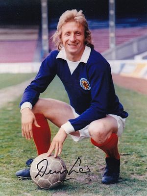 Autographed DENIS LAW 1974 - Col photo measuring 8 x 6, depicting Scotland centre-forward DENIS