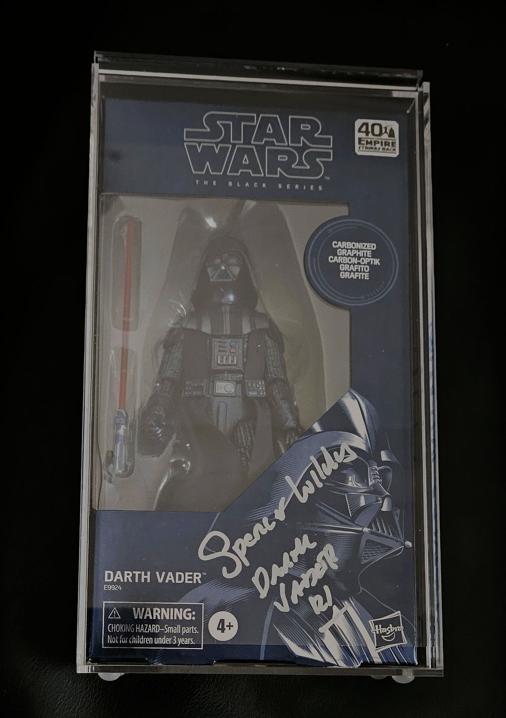 Lot 217: Spencer Wilding signed case of Darth Vadar figure....