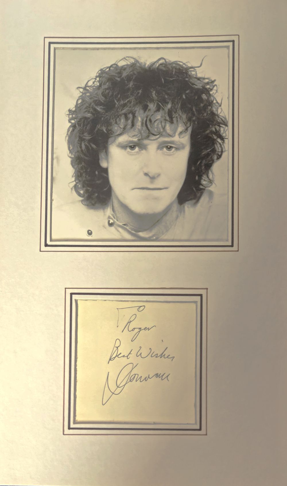 Lot 269: Donovan signature piece mounted below black and white...